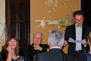 ...as he proposes a toast to the guests