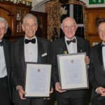 Paul and Chris proudly display their 40-year scrolls