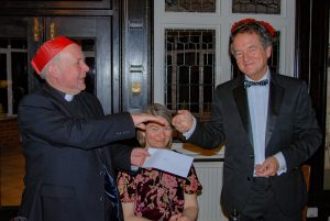 President Paul presents a cheque to Fr Jack re proceeds from the Family Quiz. Funds go towards refurbishment of the church.