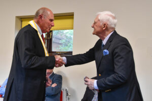 Pat welcomes Richard as a joint member of East Grinstead
