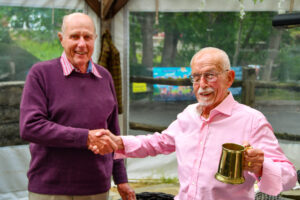 Pat presents award to Max for most visits