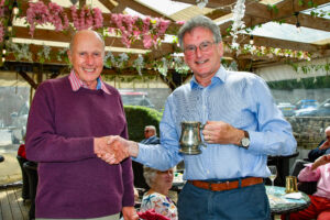 Pat presents award to Nick for contribution to the Circle