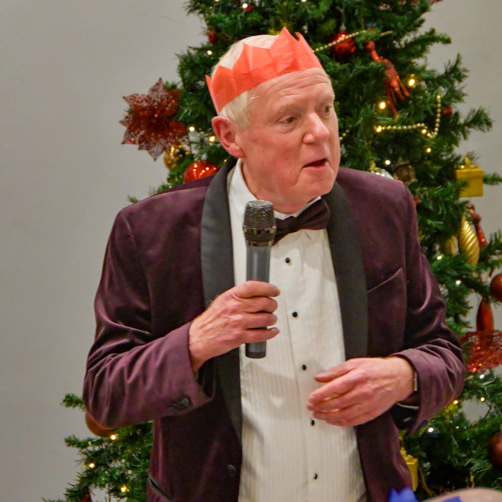 President Larry proposes a toast to the guests