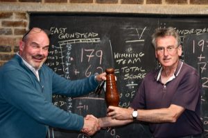 Nick presents the substitute trophy to Tandridge President Alastair