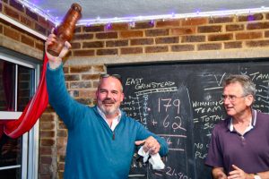 Alastair hold 'trophy' aloft